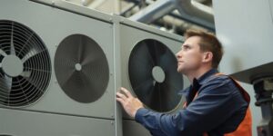 Technician working on an HVAC unit